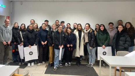 Group picture of Prof. Dr. Jochem Kotthaus' seminar during an excursion to the shooting training center in Bochum