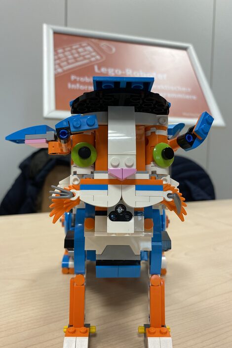 Photo of a Lego robot that looks like a cat